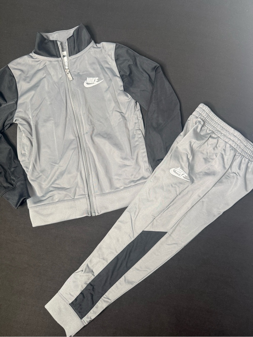 Boys Nike Gray and Black Utility Track set, size 6M. New without tags.